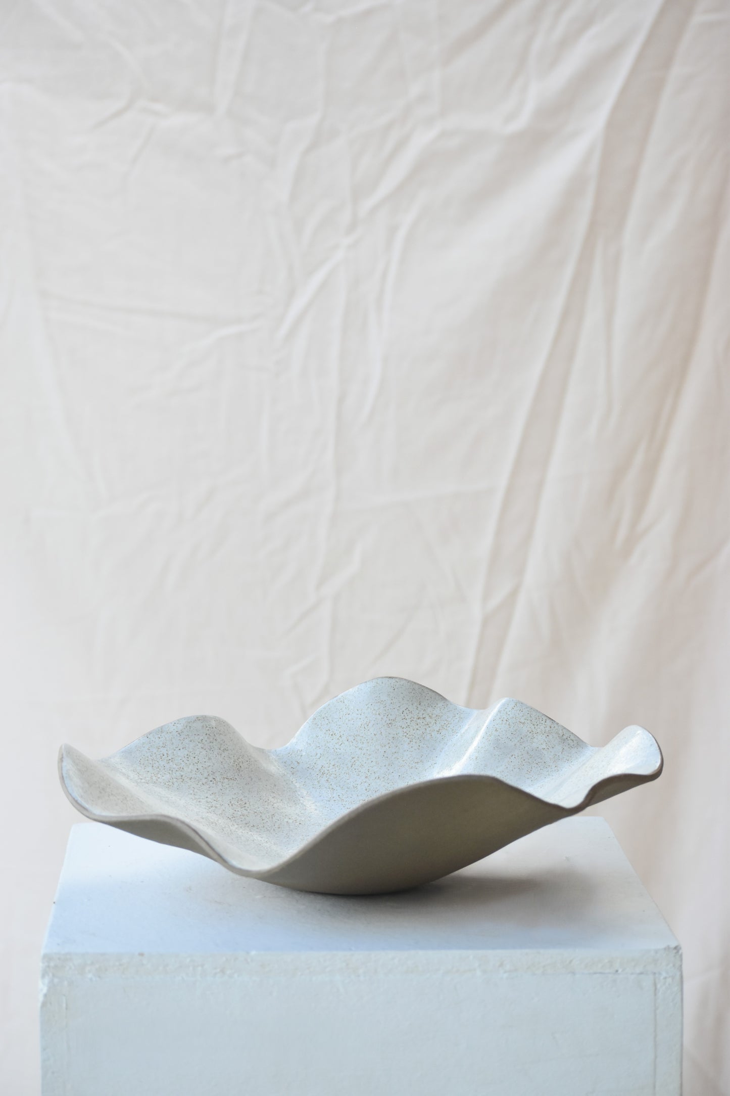 Speckled wave bowl